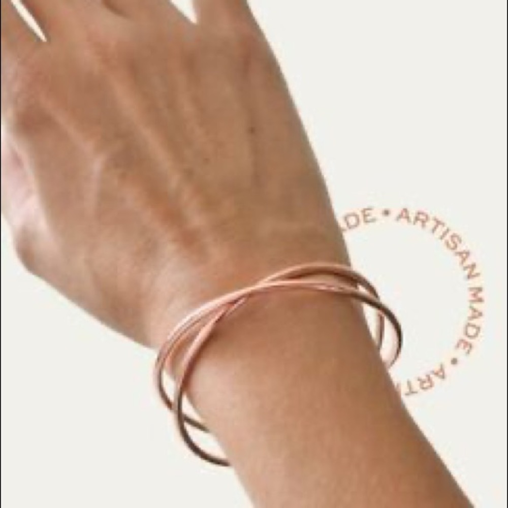 Tribe Alive rose gold crisscross bracelet. New